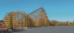 tall wooden roller coaster with flags